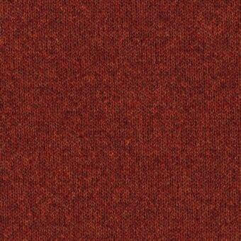 Brick red fabric texture with a dense, granular surface and matte finish, displaying subtle tonal variations and a nubby, fibrous composition.